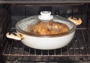 How do I get burnt food off the bottom of a pan?